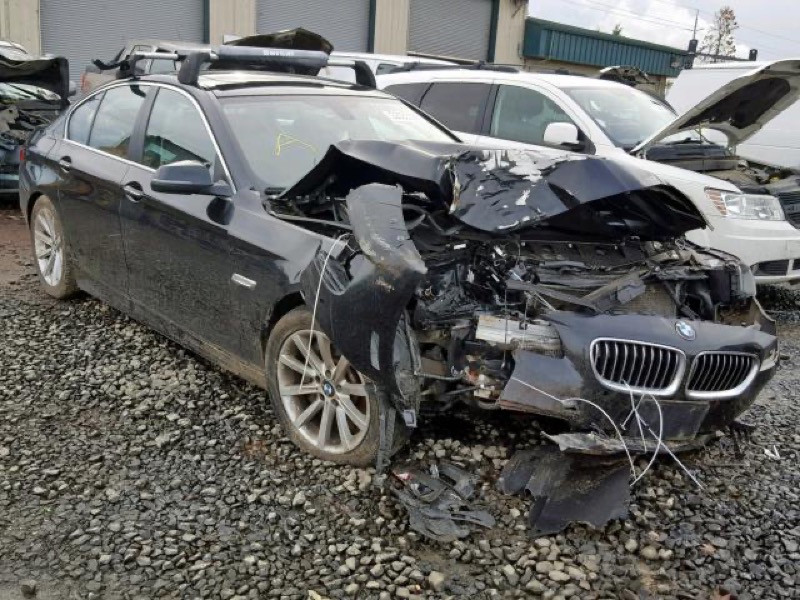Vehicle photo: front three-quarter, major damage
